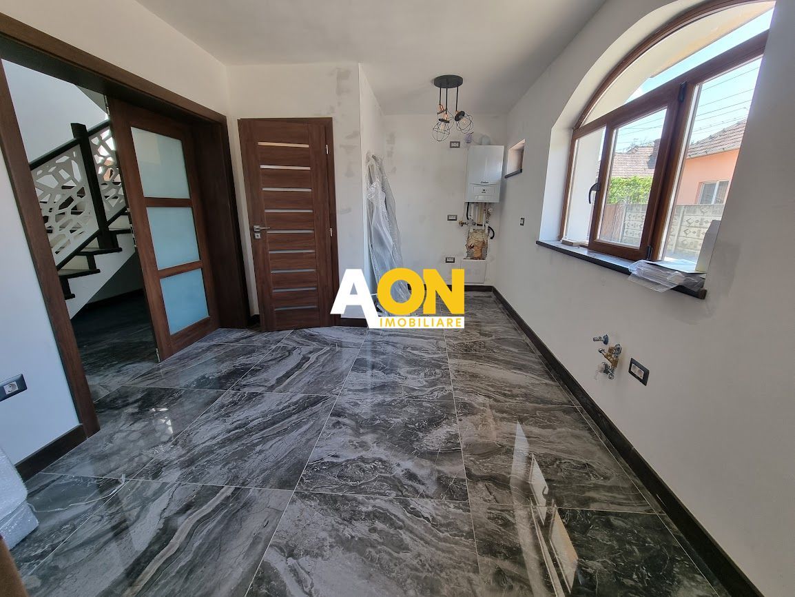 Casă modernă cu 3 dormitoare, terasă și teren generos - Poză 6