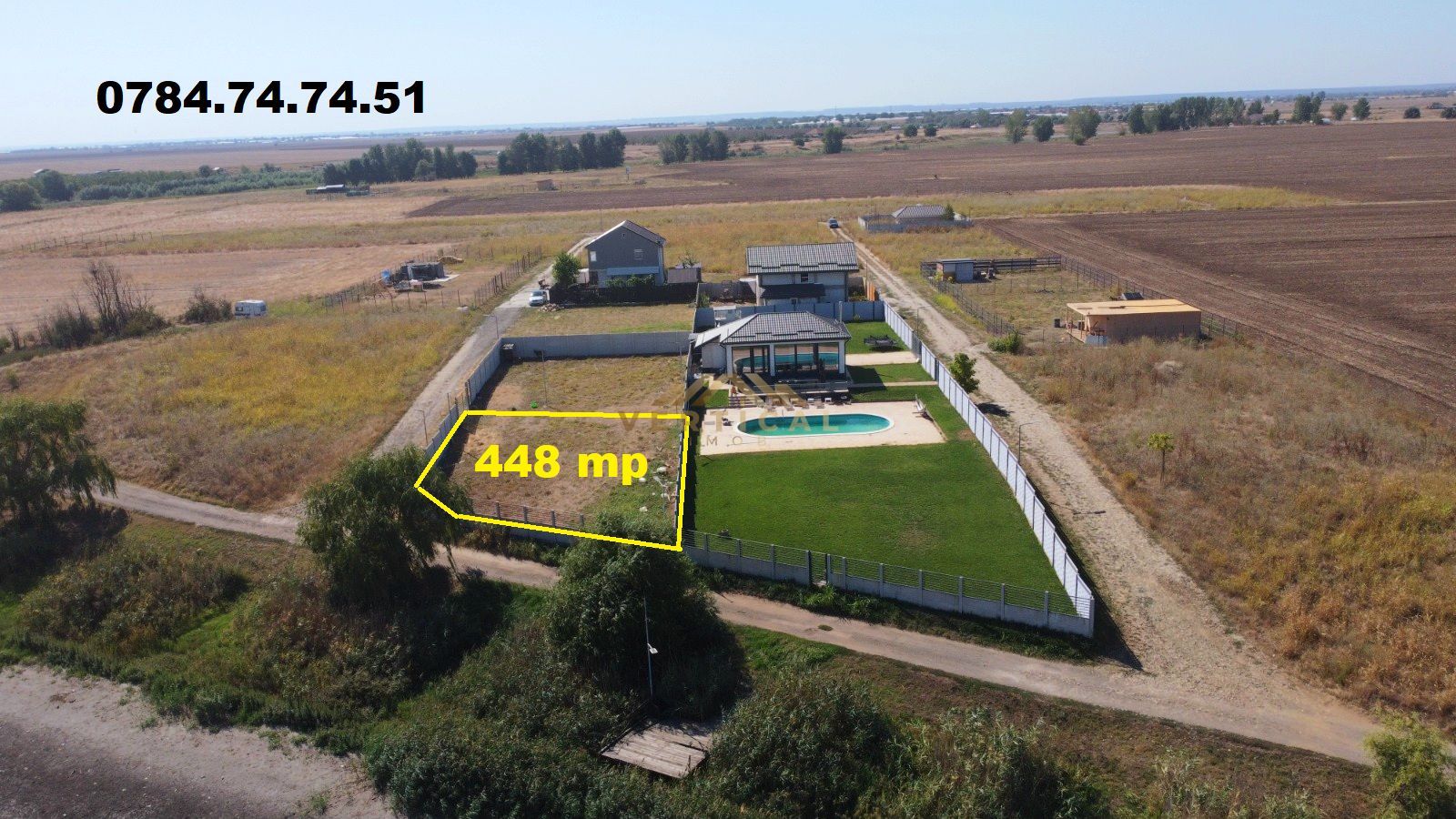 Teren cu vedere la lac - comuna Berceni - Poză 1