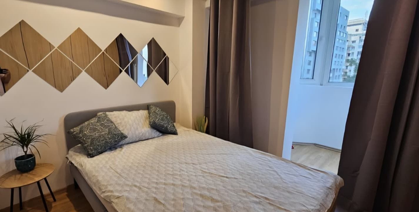 Închiriere 2 Camere Unirii, Decomandat Bloc Reabilitat - Poză 1