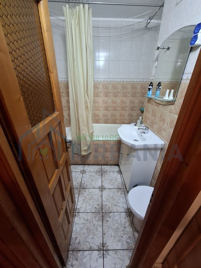 Apartament cu 2 cam D Dacia peste stradă de Biserică - Poză 5
