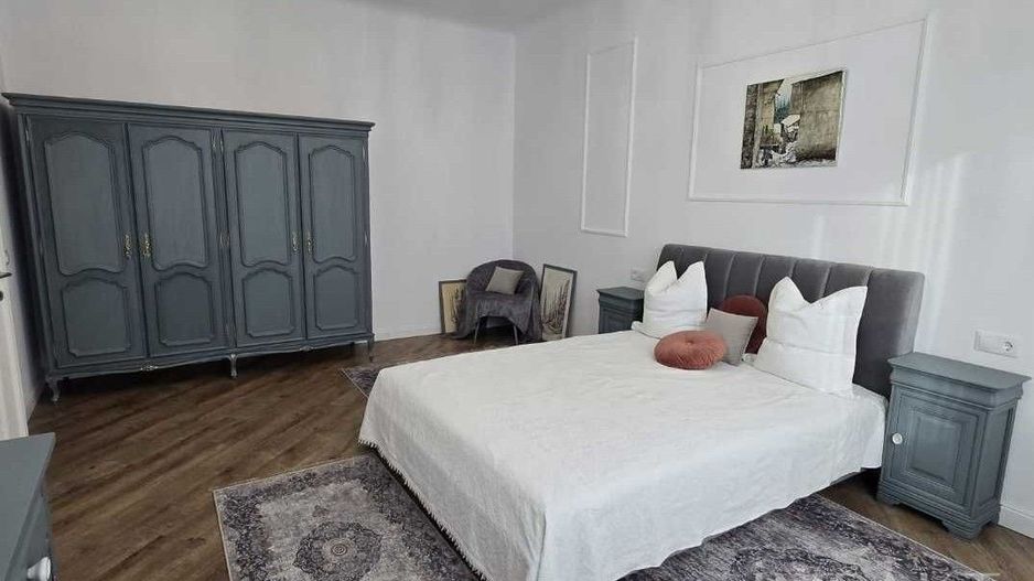 Apartament modern cu 3 camere si gradina aproape de centru - Poză 1