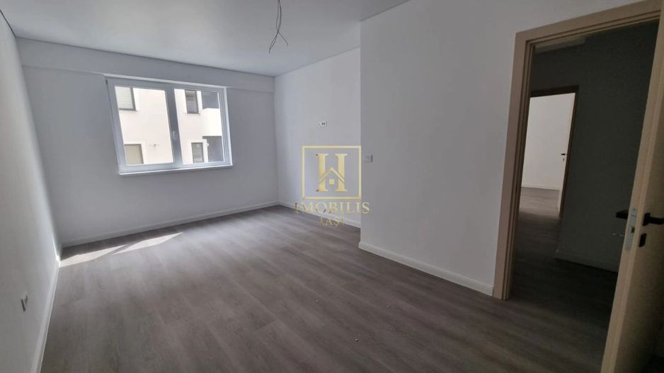 Apartament NOU finalizat 2 camere Decomandat 62 mp Bucium 99500 euro - Poză 2