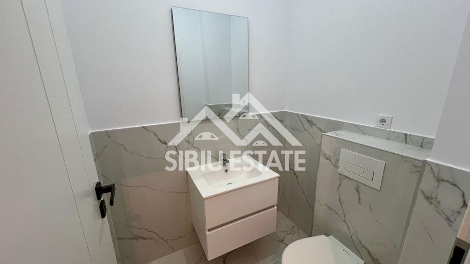 Apartament cu 3 camere, 2 bai, boxa 20 mp. loc de parcare -Finisat la cheie - Poză 7