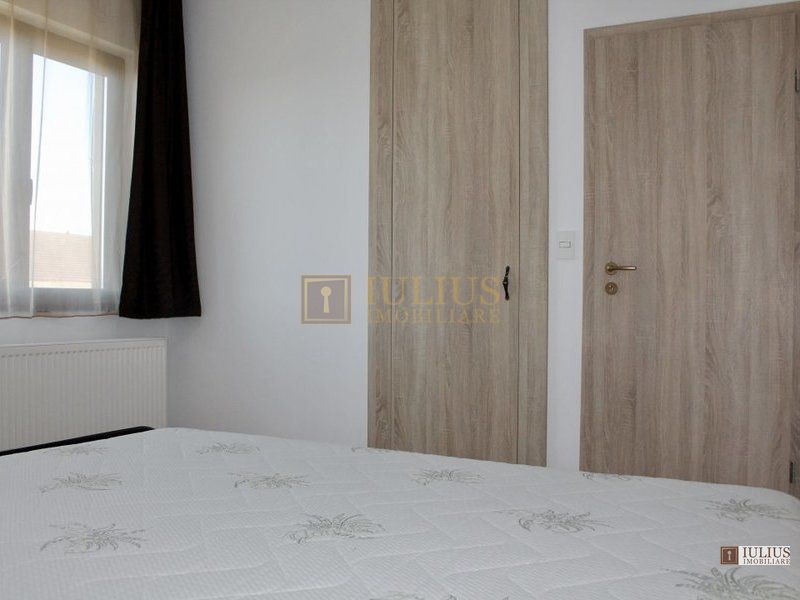 2 dormitoare, 80 mp utili, gradina si curte proprie de 300mp. - Poză 12