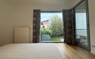 2 camere cu design industrial – un refugiu urban cu vedere spre gradina - Poză 11
