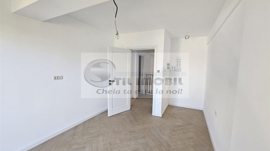 Apartament exclusivist dispus P+1E + curte 70mp - Poză 11