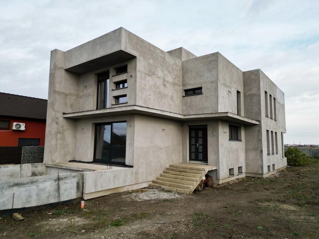 Vilă modernă pe 3 niveluri la gri în Poltura - Poză 4