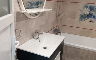 Casă individuală cu 2 apartamente separate, teren 650 mp, garaj și terasă - Poză 4