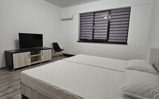 Garsoniera, 42 mp, decomandata, bucatarie 11 mp, mobilata/utilata - Poză 1