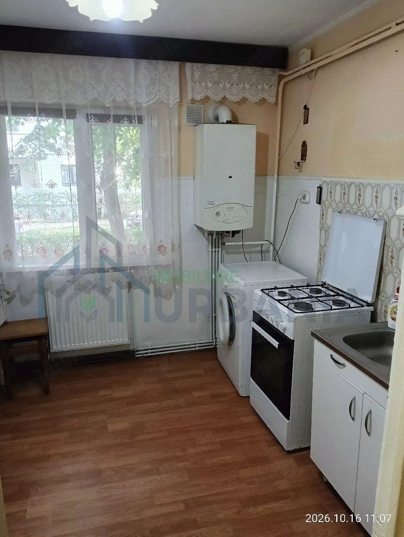 Apartament cu 2 camere decomandate în Nicolina 2, parter - Poză 1