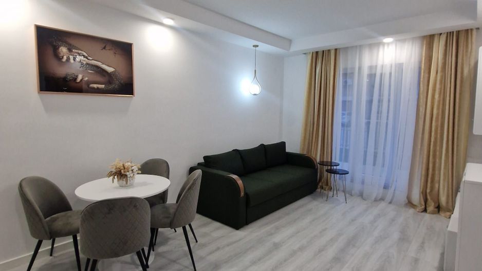 Garsonieră modernă cu grădină proprie în Cosmopolis – investitie - Poză 1