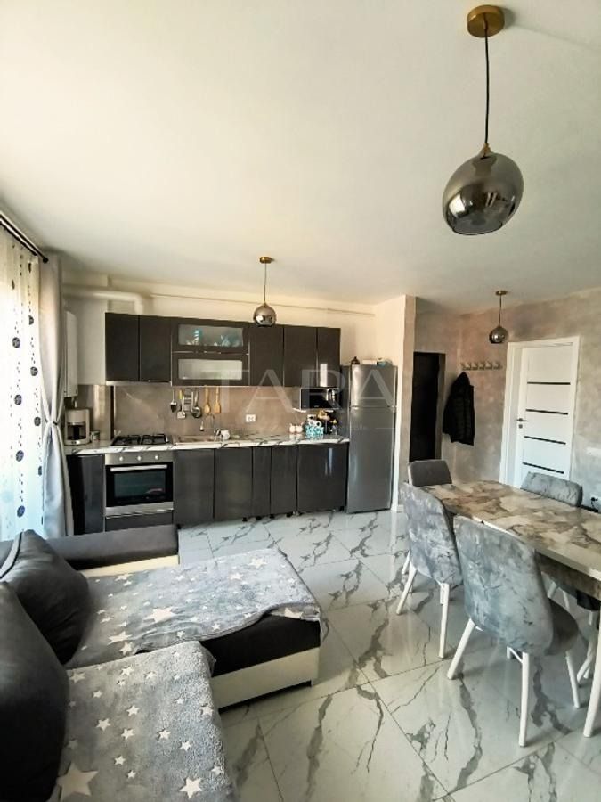 Apartament modern cu 3 camere, 65 mp + balcon 12 mp. - Poză 2