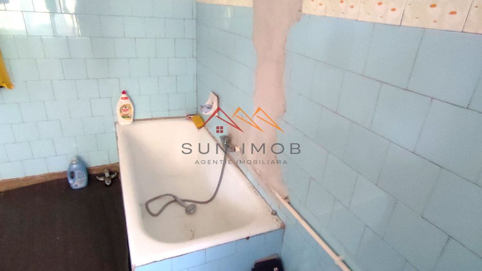 CASĂ DE VÂNZARE | 9 CAMERE | TEREN 1.000 MP | BĂICOI – ZONĂ CENTRALĂ - Poză 9