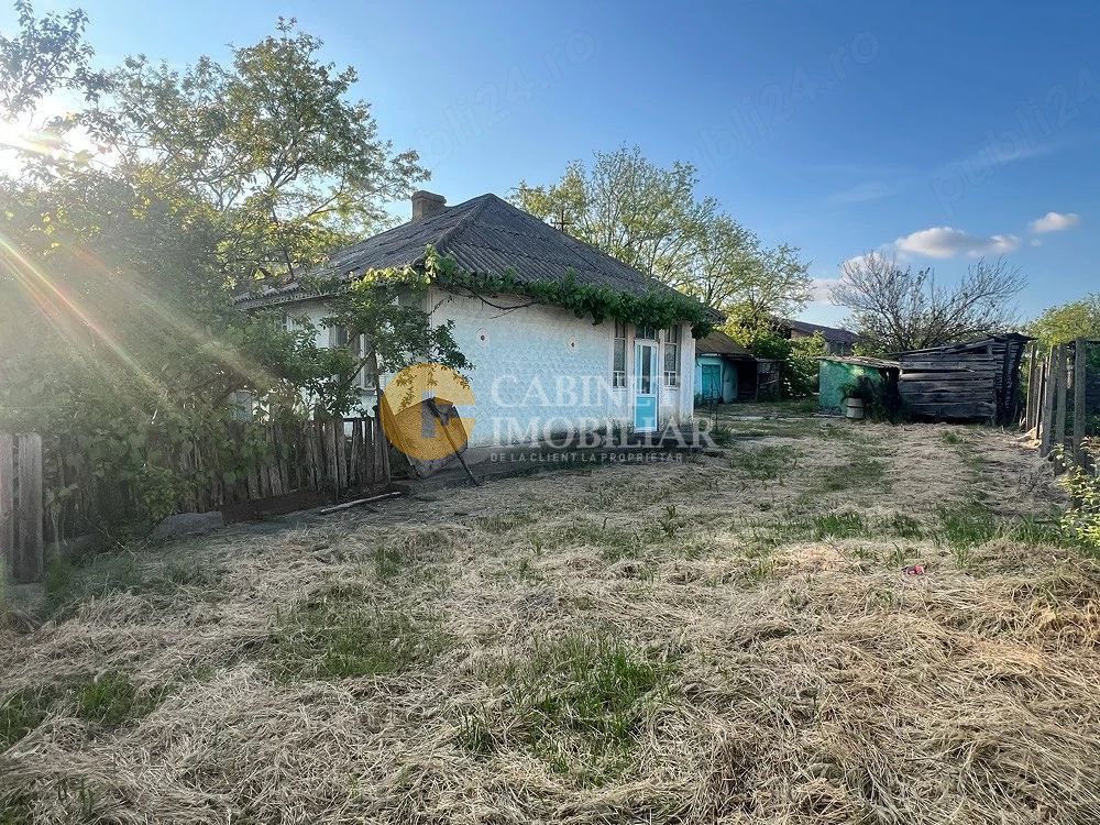 Proprietate generoasă: Casă cu 4 camere, anexe și teren de 3000 m²-Com. Țiganași - Poză 3