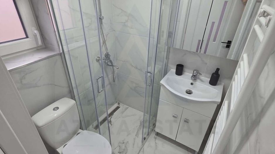 Garsoniera moderna la casa cu curte prima inchiriere in zona Strand - Poză 6