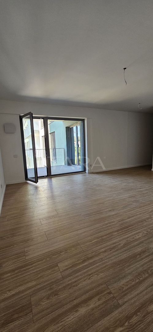 Apartament cu parcare subterană, eficienT energetic. - Poză 1