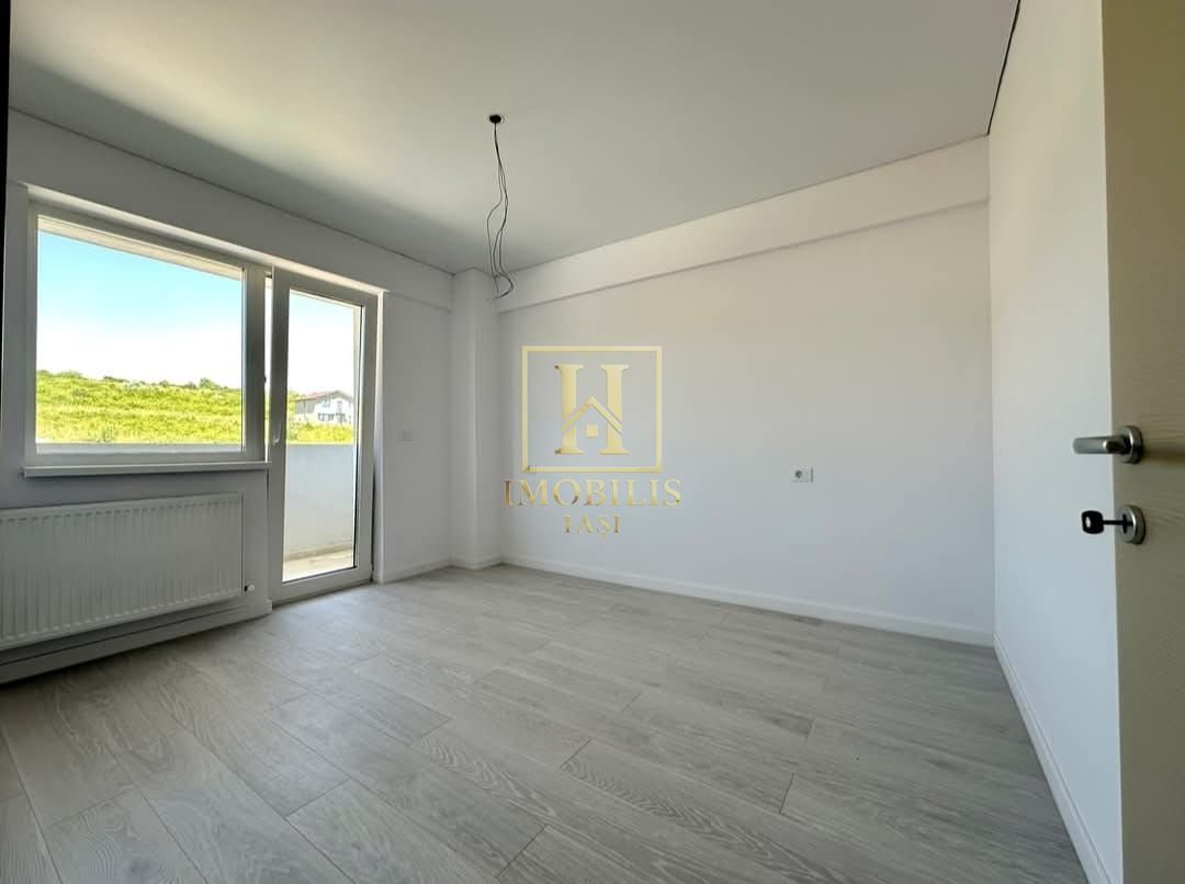 Apartament 1 camera decomandat 40 mp Bucium 66300 euro - Poză 1