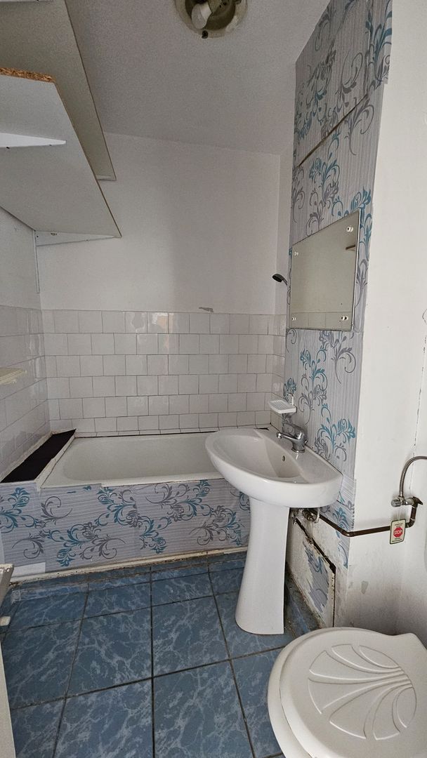 Spitalul Judetean-Zizinului garsoniera in bloc apartamente - Poză 12