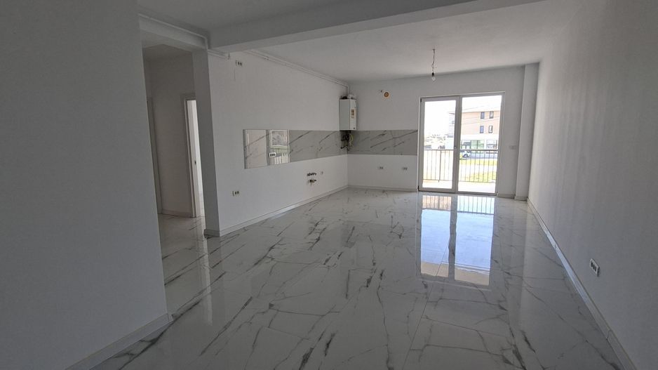 Apartament cu 3 camere si un loc de parcare - Poză 1