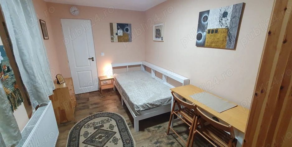 Închiriez garsonieră la casă,  Unirii, centrală proprie - Poză 1