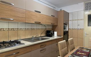 Apartament cu 2 camere, 2 bai, decomandat, etaj 1 - zona Racadau - Poză 4