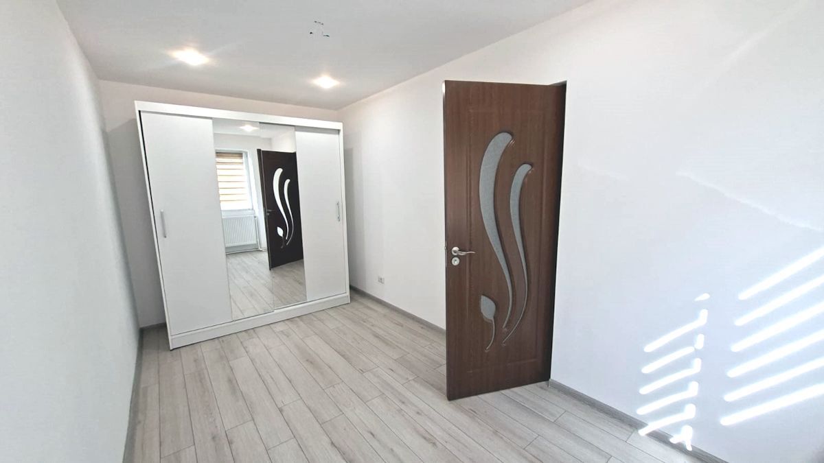 Apartament cu 2 camere, complet renovat, în zonă centrală din Tecuci - Poză 7