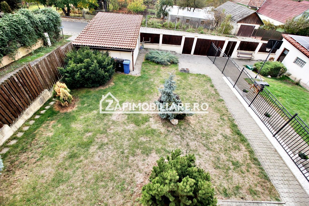 Casa 3 camere, 2 bai,1 garaj,teren 360 mp.zona Dambu Pietros - Poză 21