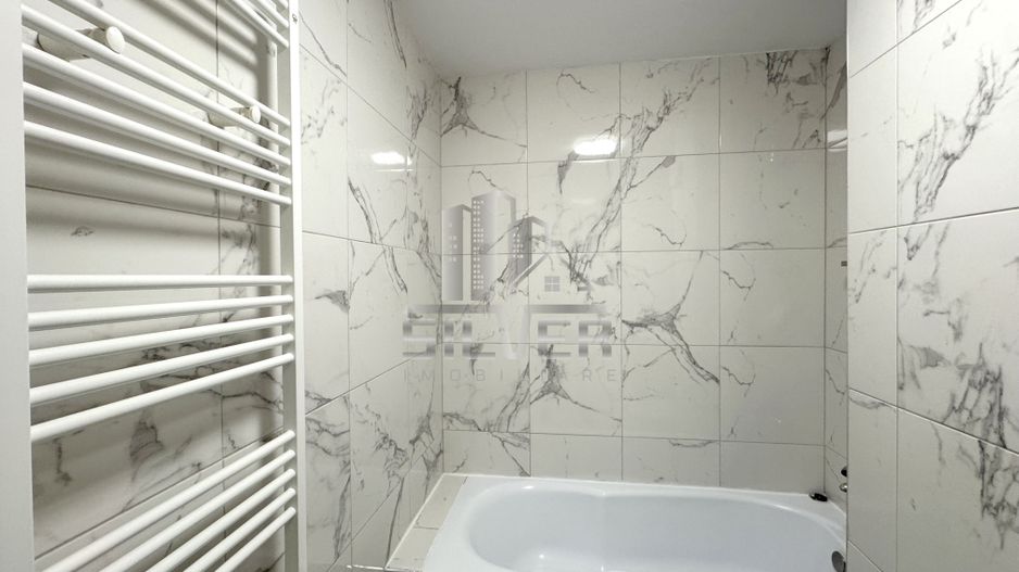 Apartament cu 2 camere/terasa 37 mp/garaj/imobil calitativ/Eroilor - Poză 9
