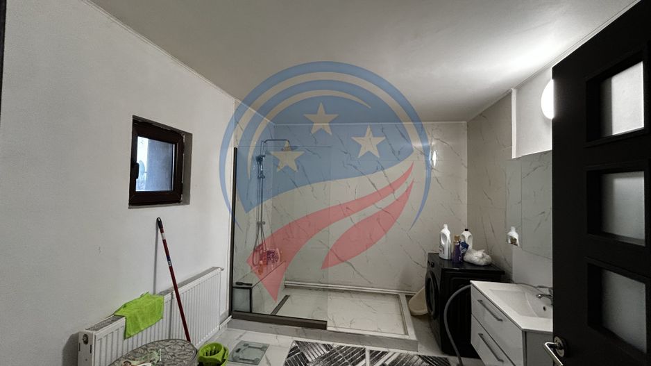 Casă spațioasă P+1+M pe teren de 902 mp – ideală pentru familie - Poză 10