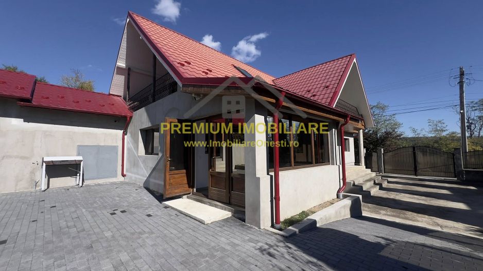 Casa de vanzare la 13 km de Onesti - Poză 2