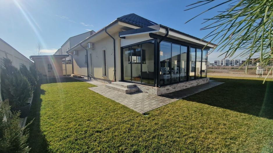 Casă complet mobilată și utilată, cu grădină amenajată | teren 500 mp - Poză 4