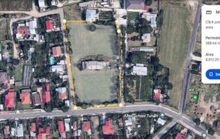 Tunari, langa Primarie, cu pozitie excelenta, 8.800 mp. teren stradal 1 Decembrie