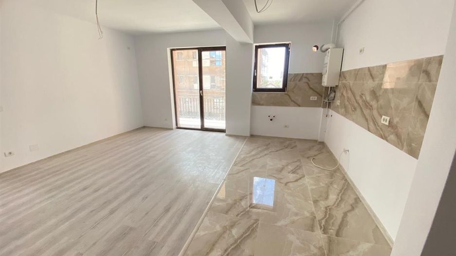Apartament 2 camere bloc nou open space loc de parcare parter - Poză 2
