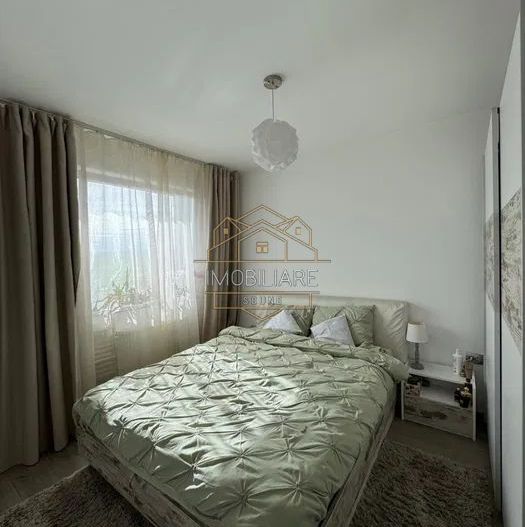 Apartament într-o zonă liniștită cu balcon și parcare - Poză 1