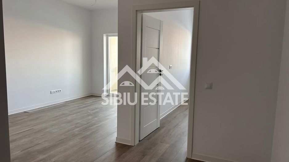 Garsoniera 41 mp, balcon bucatarie separata , intabulata zona Brana - Poză 13