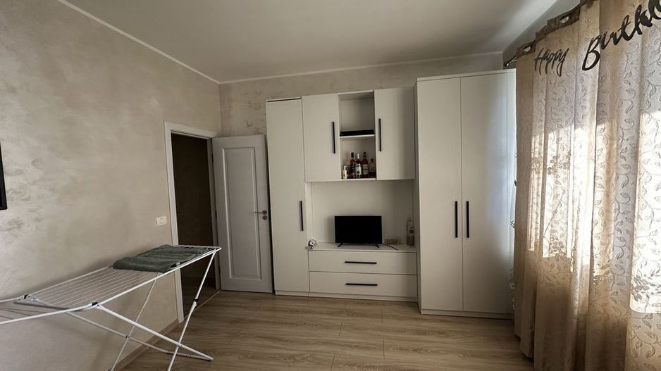 Apartament de vanzare 2 camere Giroc cu gradina 23 mp+2 locuri de paracre. - Poză 1