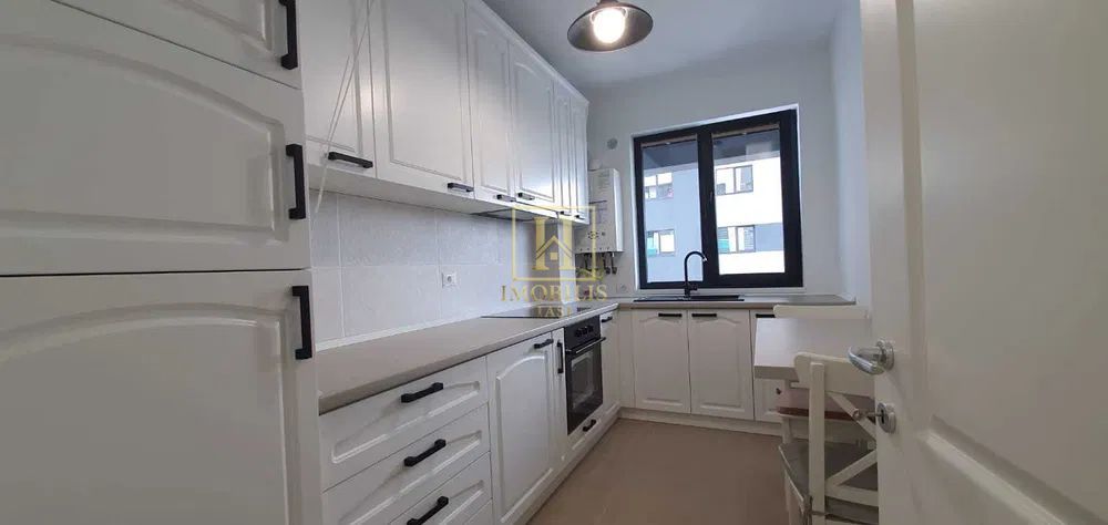 Apartament 2 camere,Dec.,54.6 mp Pacurari 133000 euro + loc de parcare - Poză 1