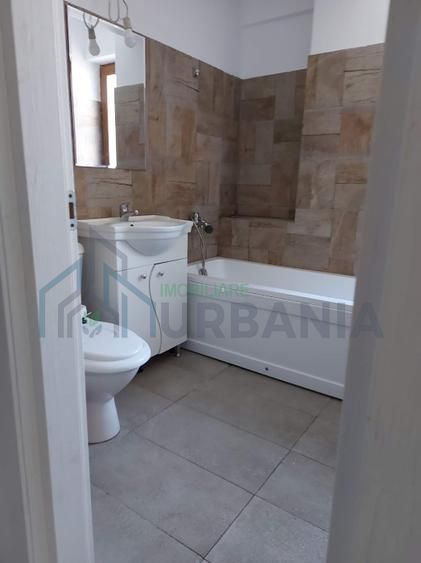 închiriez apartament cu o camera - Poză 6