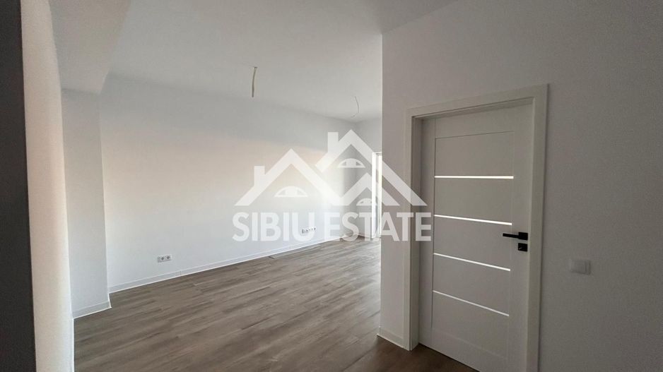 Garsoniera 41 mp, balcon bucatarie separata , intabulata zona Brana - Poză 21