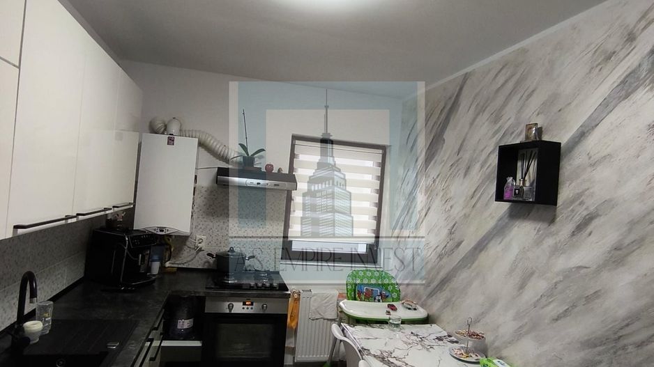 De vanzare un superb apartament de 2 camere in zona Tractorul - Poză 9