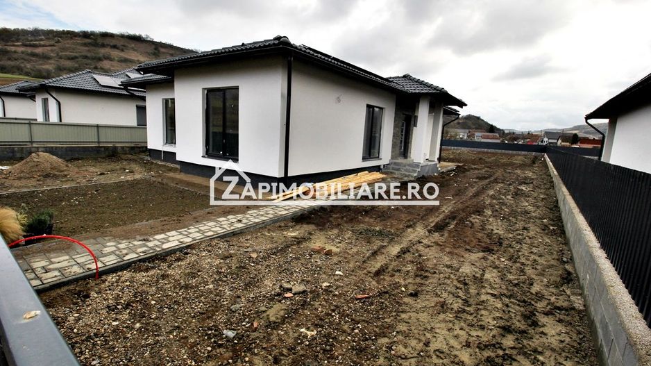 Casă la cheie pe 1 nivel 4cam. 2 bai,1 dresing 650 mp. teren - Poză 25
