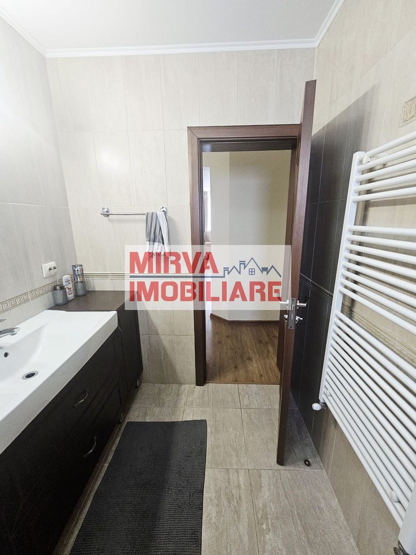 Vilă spațioasă Strejnicu S+P+1E+M, 8 camere, garaj, teren 595 mp - Poză 41