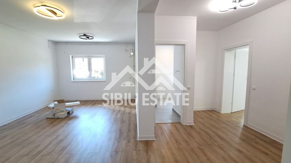 Apartament la cheie cu gradina Selimbar - Poză 1