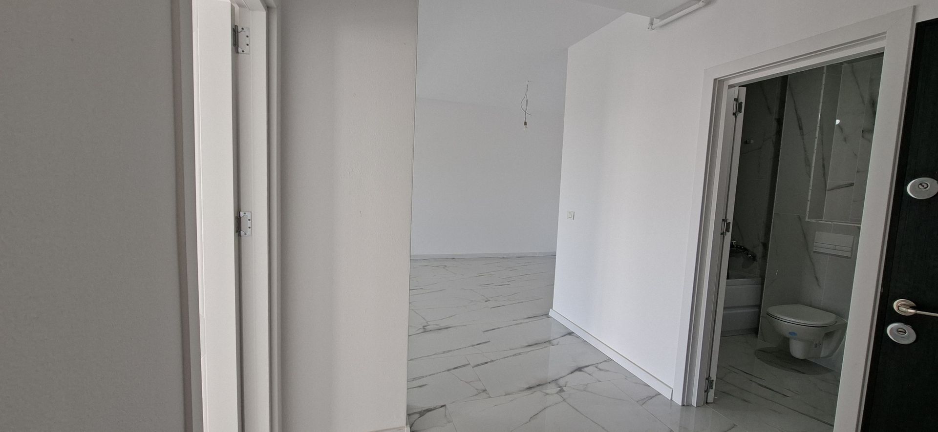 Apartament cu 3 camere si un loc de parcare - Poză 9