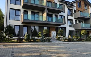 Apartament modern 49.7 mp utili 2 camere si curte 50 mp in Da Vinci - Poză 2