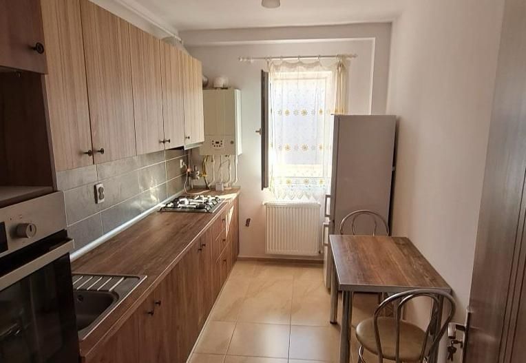 AP.2 CAMERE -POPESTI- LEORDENI, CENTRALA, PARCARE, BUCATARIE INCHISA - Poză 4