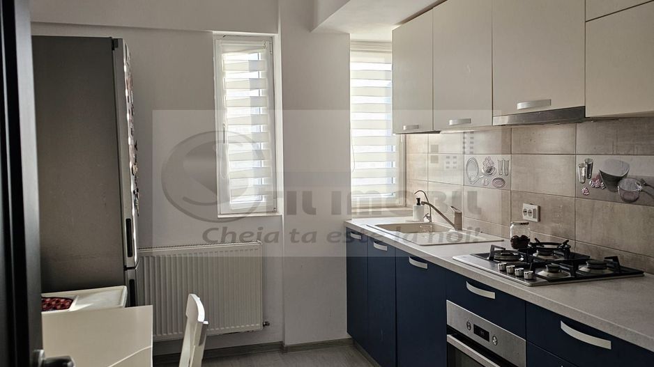 Bucium apartament 3 camere decomandat 145.000 euro - Poză 9