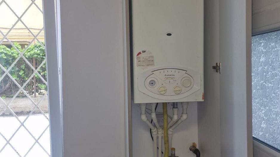 Apartament central cu o camera si loc de parcare - Poză 13