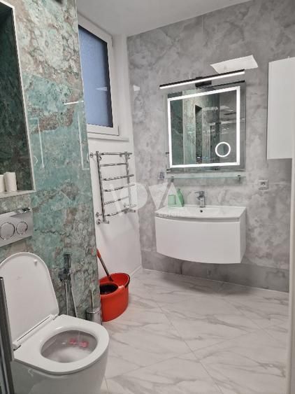 Pentru inchiriere Duplex 5 camere ( Parter + Demisol ) in vila Piata Romana - Poză 9
