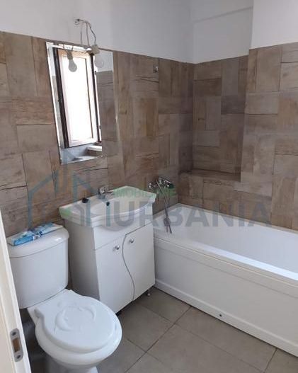 închiriez apartament cu o camera - Poză 8